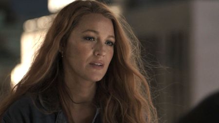 Blake Lively's Lilly with her hair down on the roof meeting Ryle