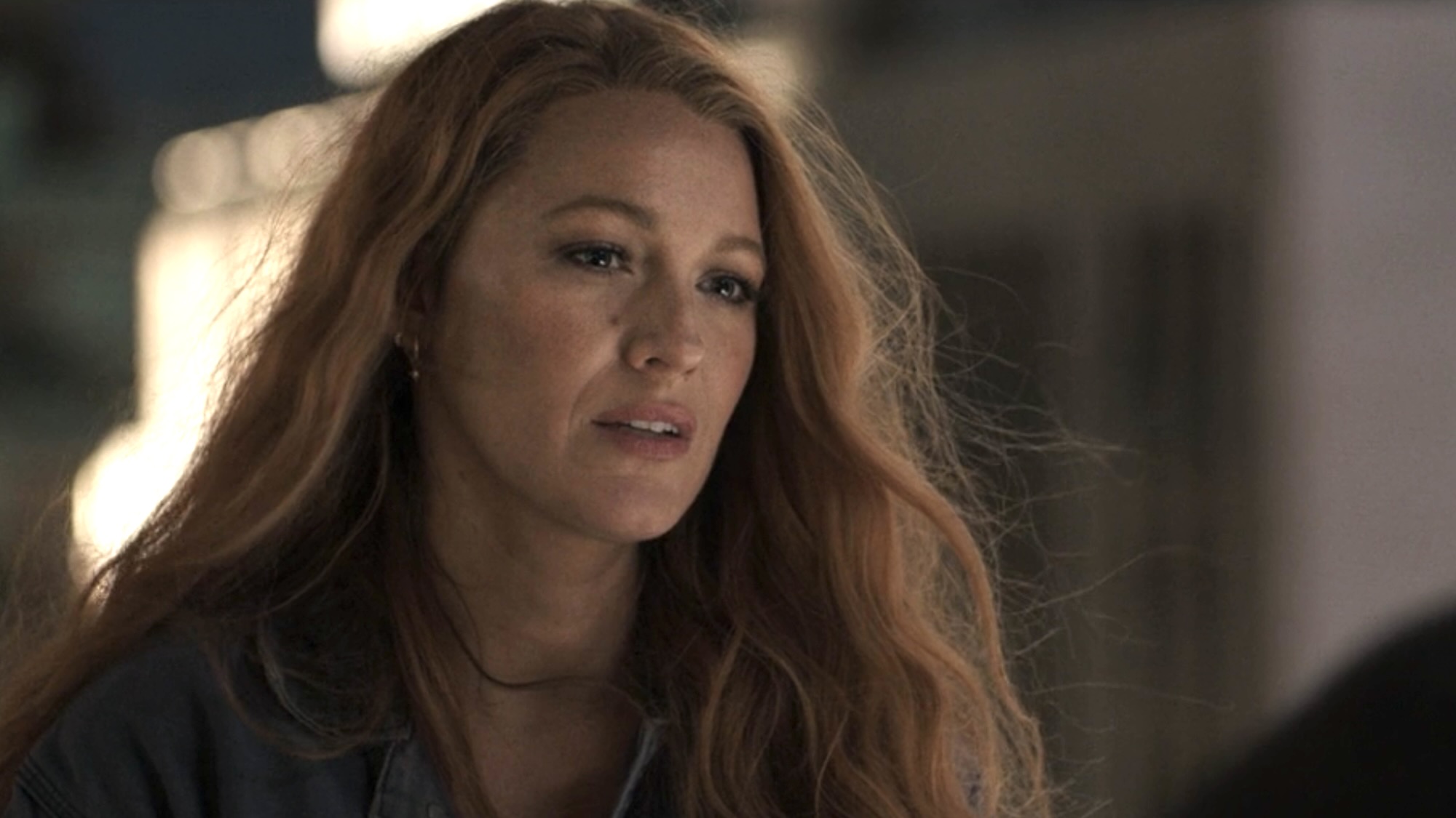 Blake Lively's Lilly with her hair down on the roof meeting Ryle