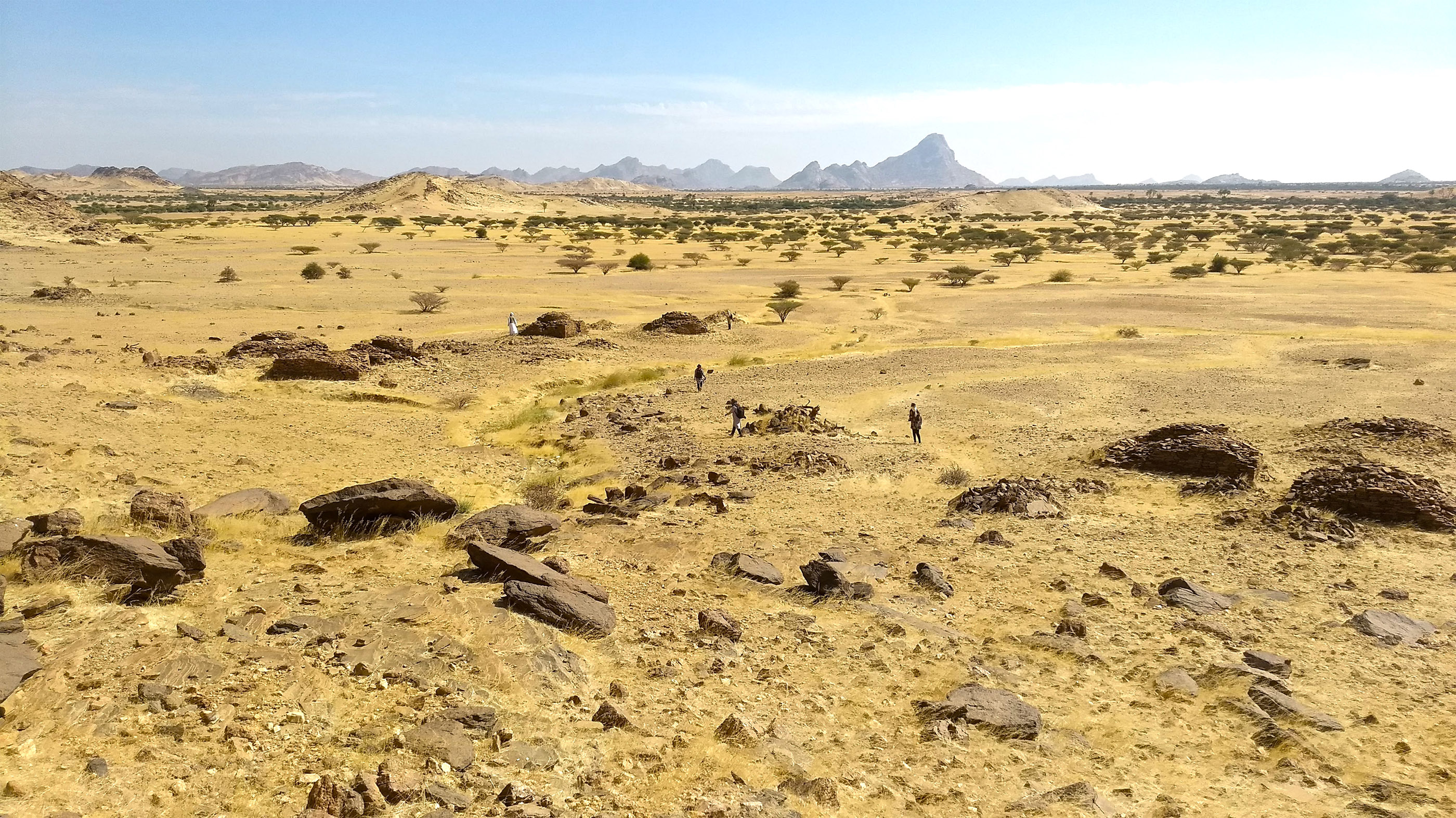  landscape view of scatters of qubba tombs around an area known as Jebel Maman.