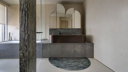 A bathroom floor with marble shape