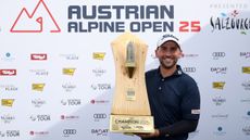 Nicolai Von Dellingshausen poses with the Austrian Alpine Open trophy after winning in 2025