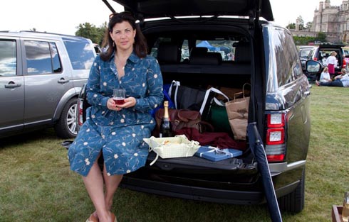 Sitting down on the job: Kirstie makes the most of a tailgate