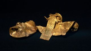 A piece from the gold and silver hoard which was found in a private field in Staffordshire, England by a metal-detector user