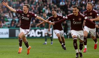 Hearts celebrate their late winner against Hibernian in the Scottish Premiership