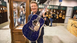 Chris Martin displays the 2.5 millionth Martin guitar at day one of the 2022 NAMM Show, June 3