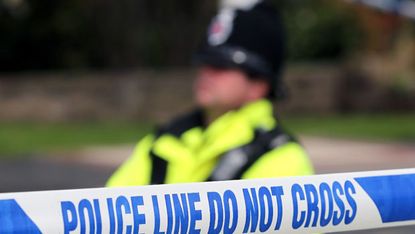 Police cordon off a crime scene