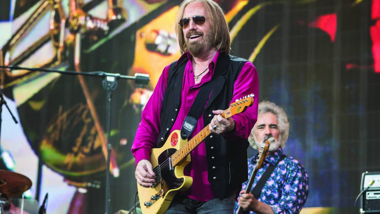 a shot of tom petty on stage