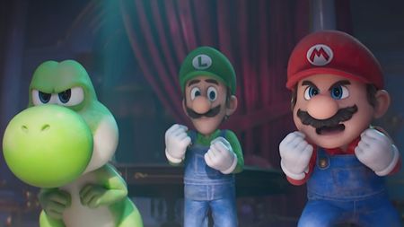 Yoshi, Luigi and Mario holding their fists up and ready to fight in The Super Mario Galaxy Movie
