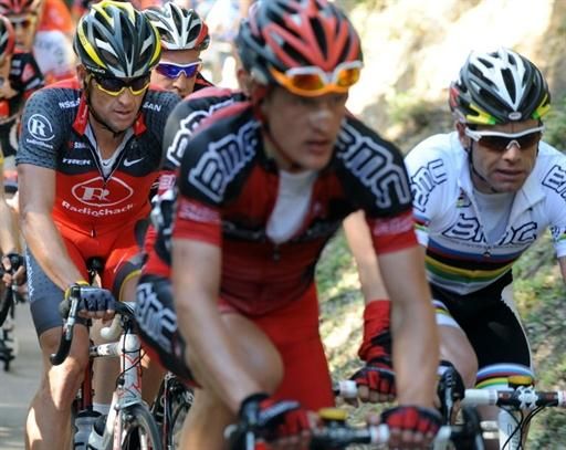 Lance Armstrong (RadioShack) rides behind Cadel Evans's BMC squad