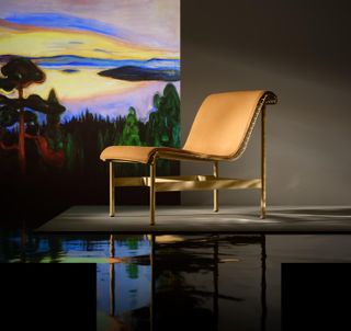 Chair displayed in front of Edvard Munch’s View from Nordstrand painting