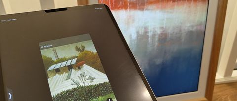 Vieunite Textura Digital Canvas review; an ipad held in front of a digital picture frame