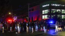 Police gather outside storage unit with suspected Brown University gunman was found dead