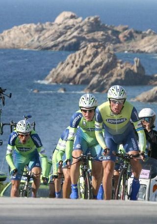 Danilo Di Luca leads the Liquigas team to the top of a climb with a stunning backdrop