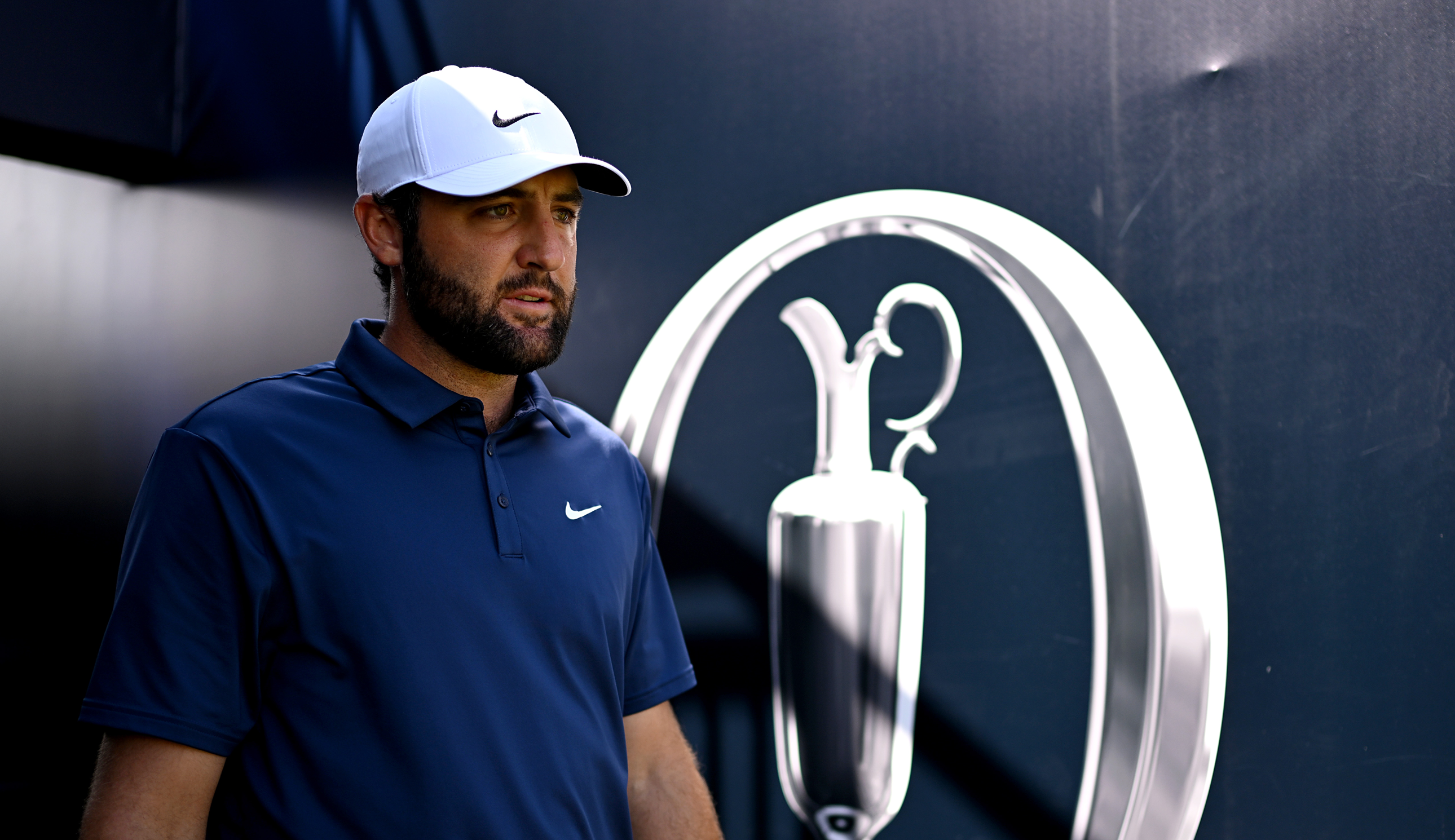 Scottie Scheffler walks off the tee