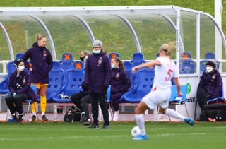 Hege Riise, middle, leads England against Canada on Tuesday