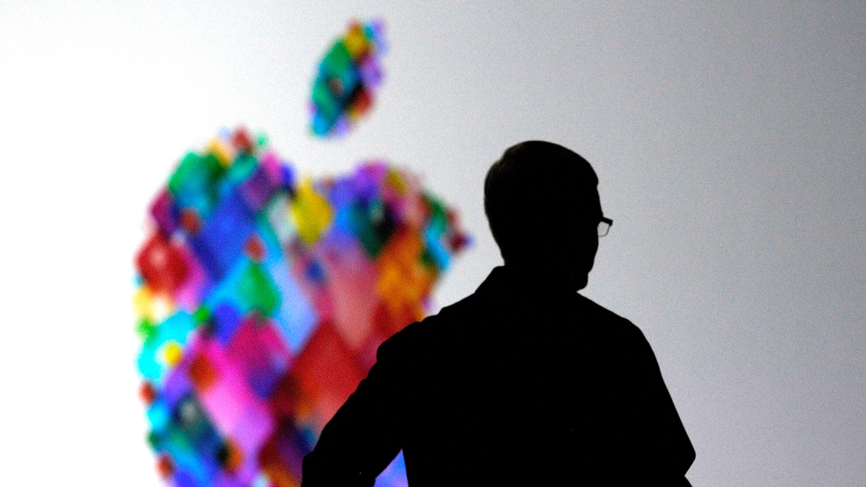 The silhouette of Tim Cook at Apple's WWDC 2012 conference