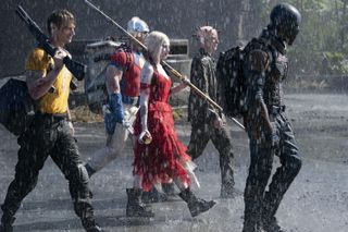 Caption: (L-r) JOEL KINNAMAN as Rick Flag, JOHN CENA as Peacemaker, MARGOT ROBBIE as Harley Quinn, PETER CAPALDI as The Thinker and IDRIS ELBA as Bloodsport in Warner Bros. Pictures’ action adventure “THE SUICIDE SQUAD,” a Warner Bros. Pictures release.