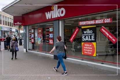 The front of a Wilko store with an administration sale sign