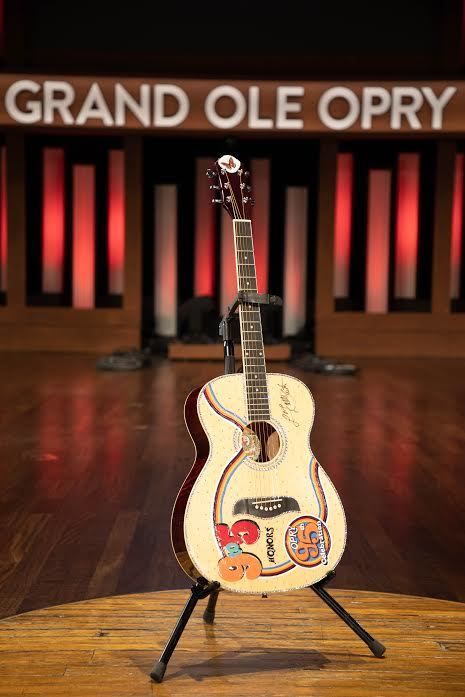 Dolly Parton is auctioning a "9 to 5" Oscar Schmidt acoustic
