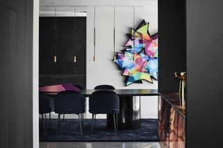 dining room with colourful art at Curatorial House in Melbourne