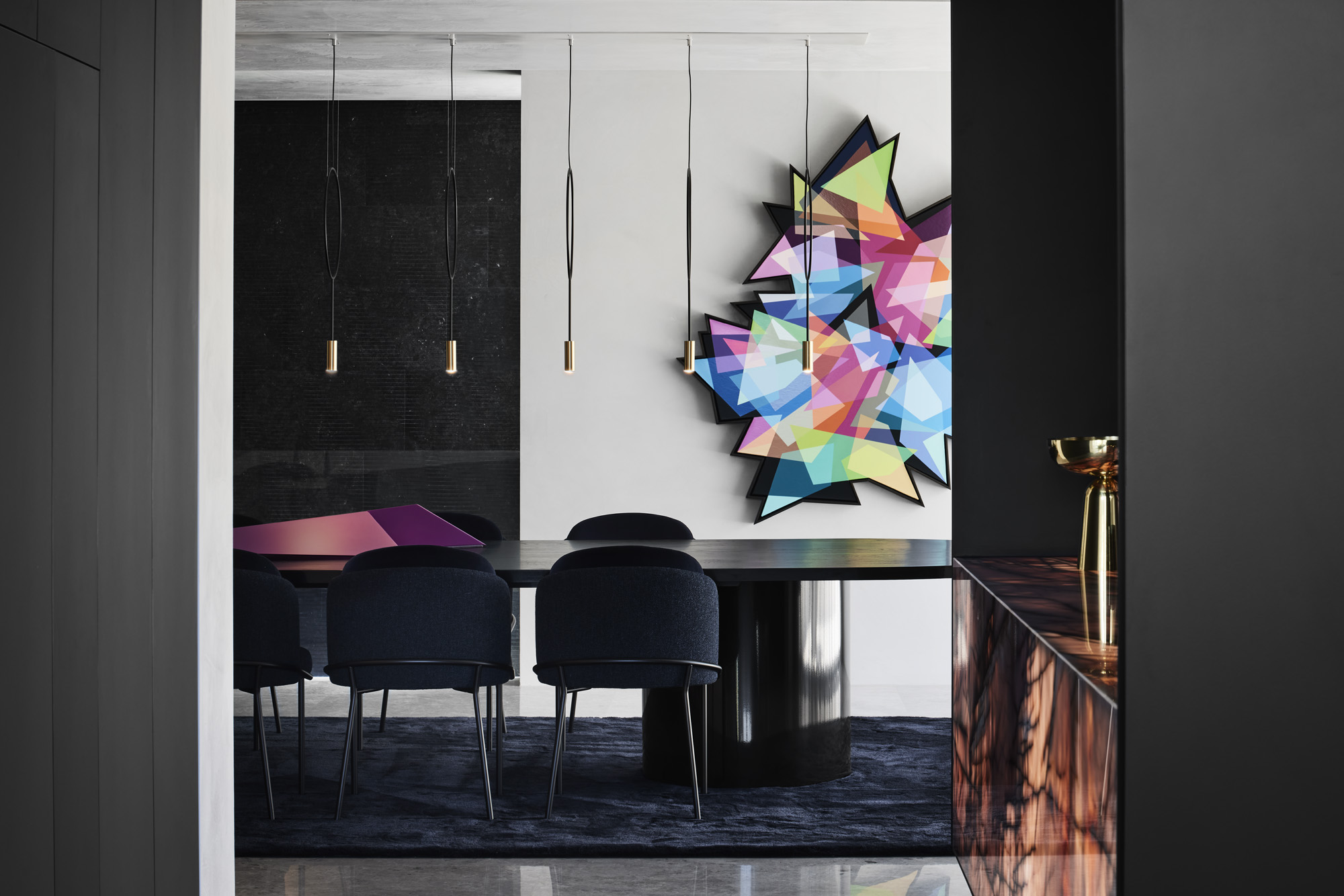 dining room with colourful art at Curatorial House in Melbourne