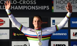 Mathieu van der Poel salutes the crowd in his rainbow jersey at cyclocross world championships 2023
