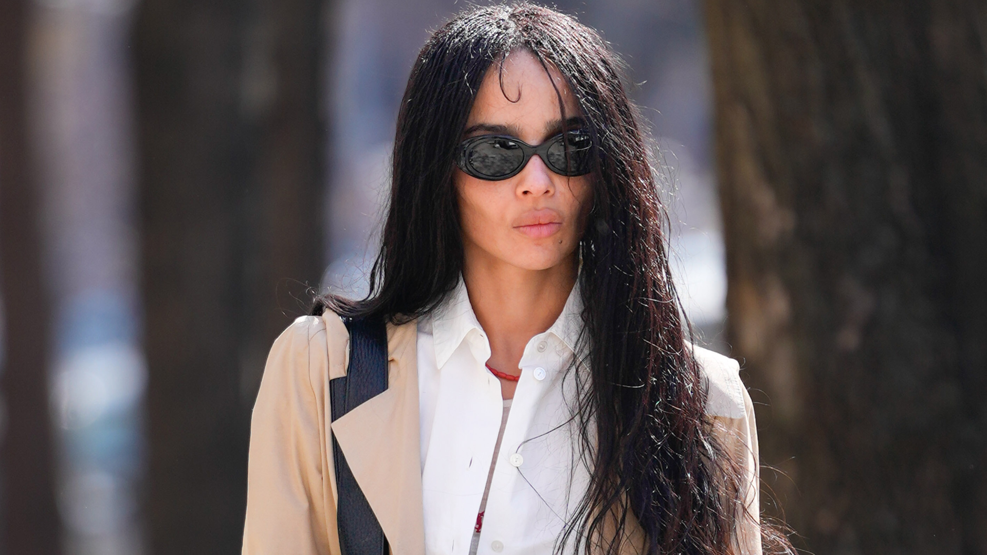 Zo&euml; Kravitz was spotted in New York City wearing a trench coat with her favorite Saint Laurent laptop bag