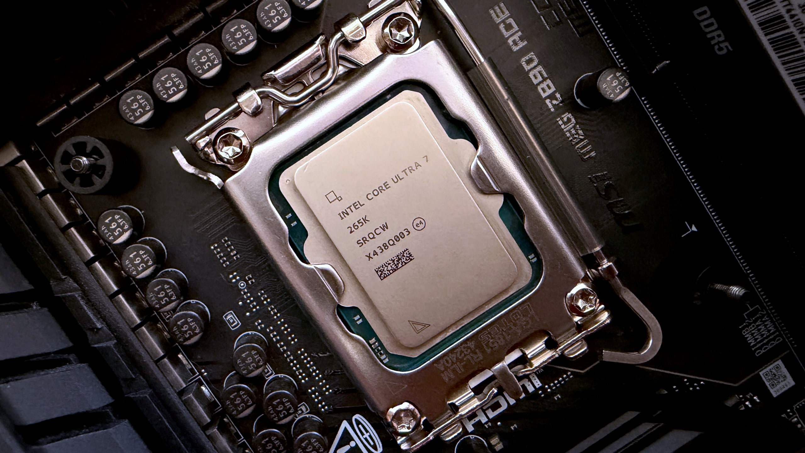 A photograph of Intel's Core Ultra 7 265K Plus processor, installed in an MSI motherboard socket