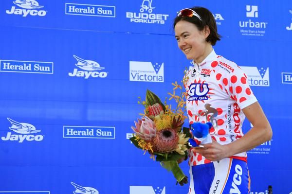Lisa Jacobs celebrates winning the Queen of the Mountain jersey