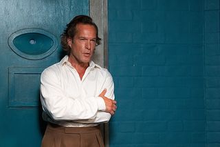 Flambeau (JOHN LIGHT) in a prison cell in Father Brown