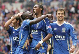 Portsmouth players celebrate their goal against Cardiff City in the 2008 FA Cup final.