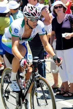 Jonathan Cantwell rides hard up the climb to keep in touch.