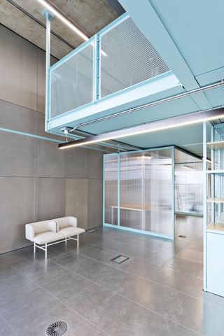 Light blue railings and door frame in an office