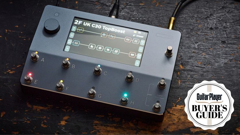 A Neural DSP Quad Cortex amp modeler on a worn wooden floor