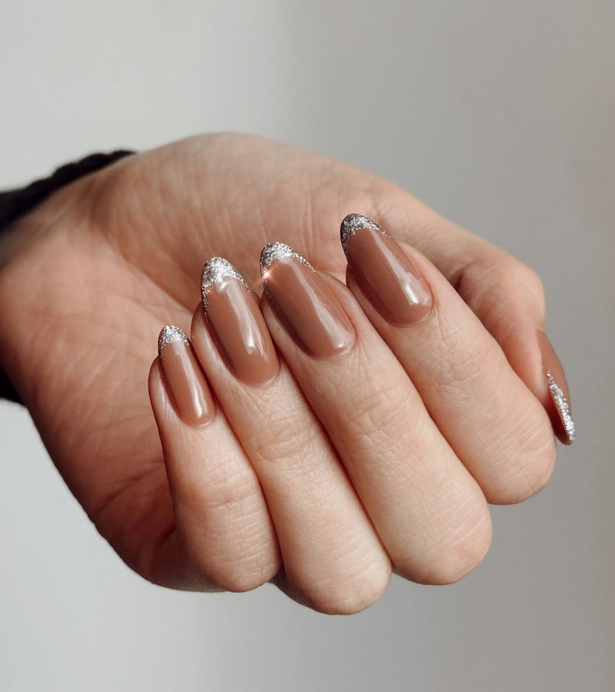 Silver micro-French manicure by Queenie Nguyen.