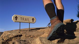 walker and a trail sign