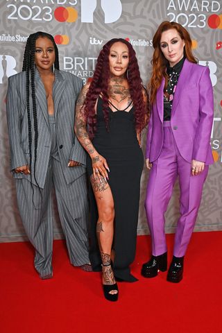 Keisha Buchanan, Mutya Buena and Siobhán Donaghy of Sugababes arrive at The BRIT Awards 2023 at The O2 Arena on February 11, 2023 in London, England