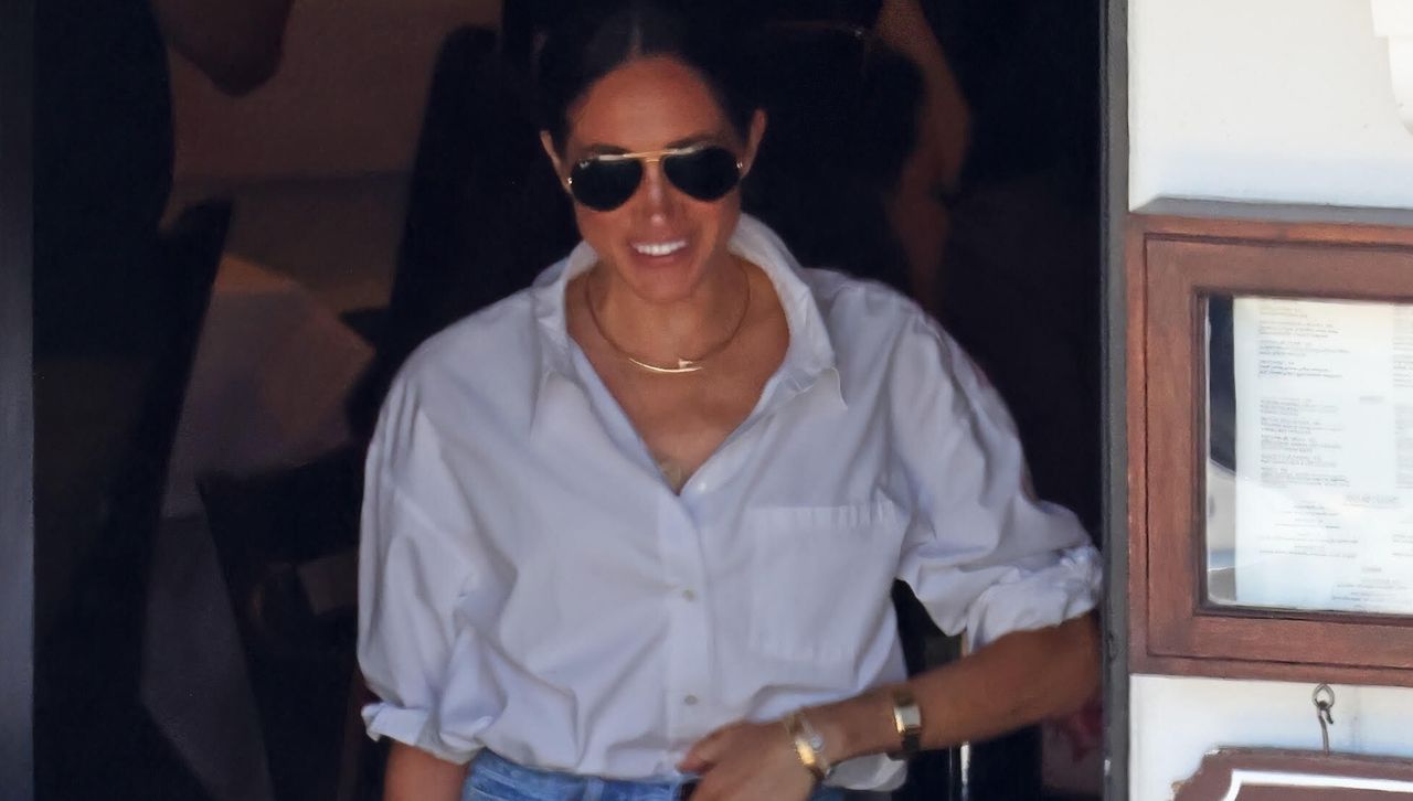 Meghan Markle wears a white button down shirt with gold jewelry and her Princess Diana Lady Dior bag in California