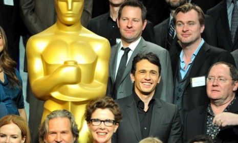 Christopher Nolan (top, right), at a Oscar nominee lunch, failed to earn a Best Director nod for &amp;quot;Inception,&amp;quot; which is in the running for Best Picture.