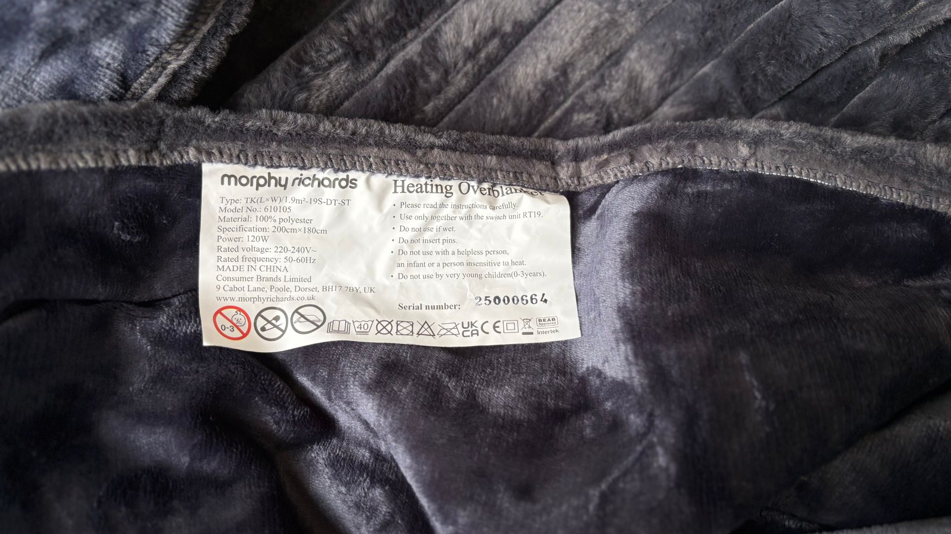 The Morphy Richards EverCosy Heated Throw on a chair, being tested for our review