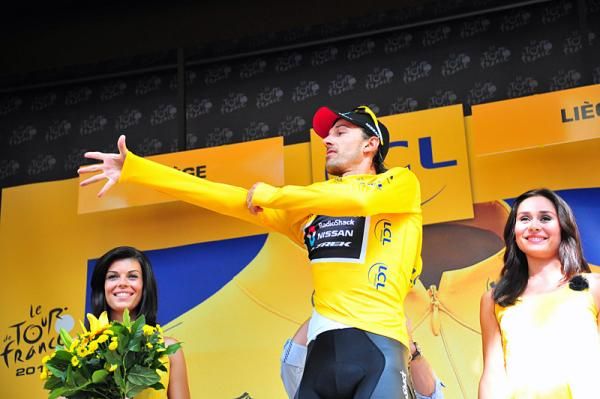 Prologue winner Fabian Cancellara dons the first yellow jersey of the 2012 Tour de France.