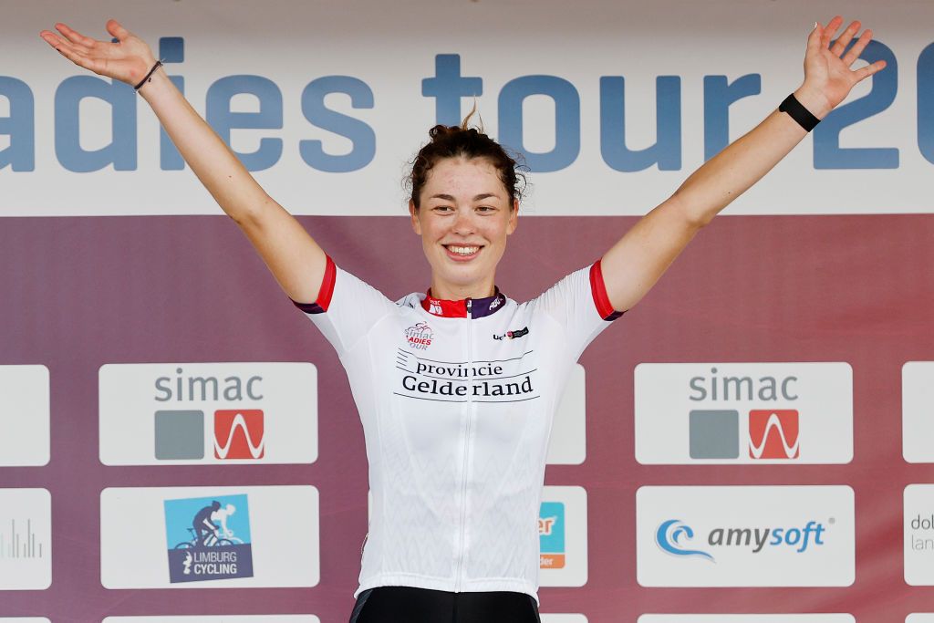 ARNHEM NETHERLANDS SEPTEMBER 04 Mischa Bredewold of Netherlands and Team Parkhotel Valkenburg White Best Young Jersey celebrates winning the stage on the podium ceremony after the 25th Simac Ladies Tour 2022 Stage 6 a 1503km stage from Arnhem to Arnhem SLT2022 UCIWWT on September 04 2022 in Arnhem Netherlands Photo by Bas CzerwinskiGetty Images