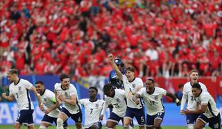 England players celebrate their penalty shootout win over Switzerland at Euro 2024.