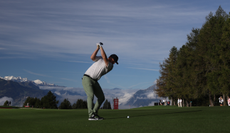 A golfer hits a shot at Crans-sur-Sierre Golf Club