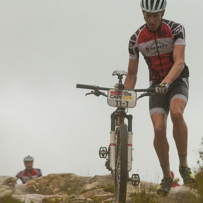 Matthys Beukes of Team SCOTT factory racing is the first rider to portage the ox-wagon track section