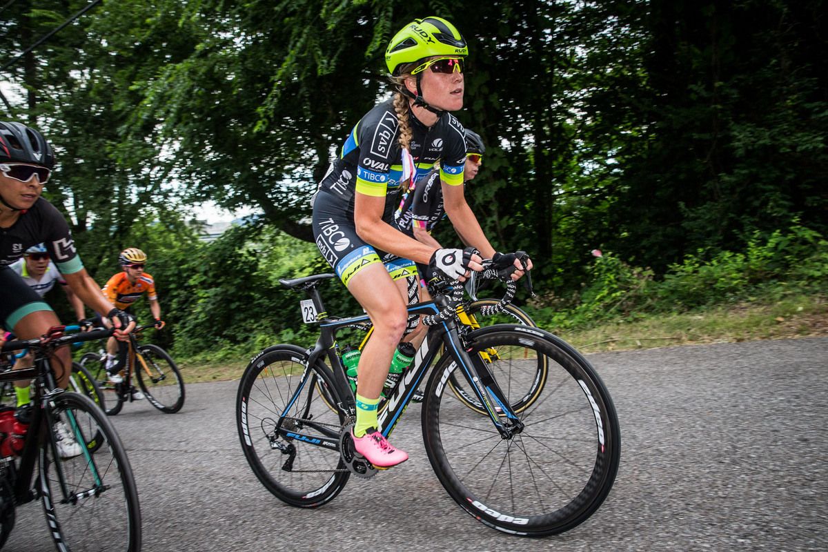 Lauren Stephens (TIBCO) at the front of the field on the way up the climb