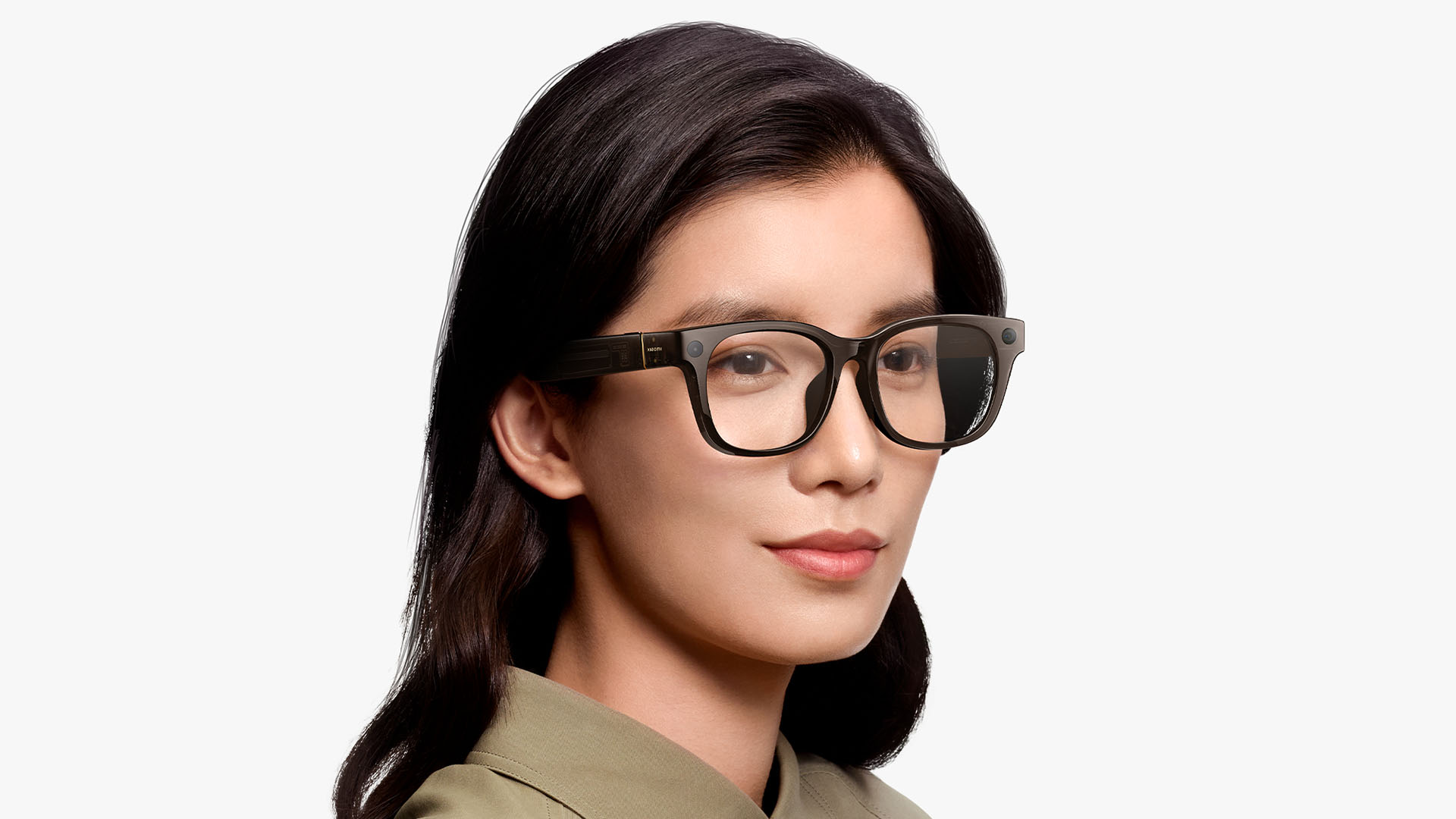 The Xiaomi AI glasses being worn by a model