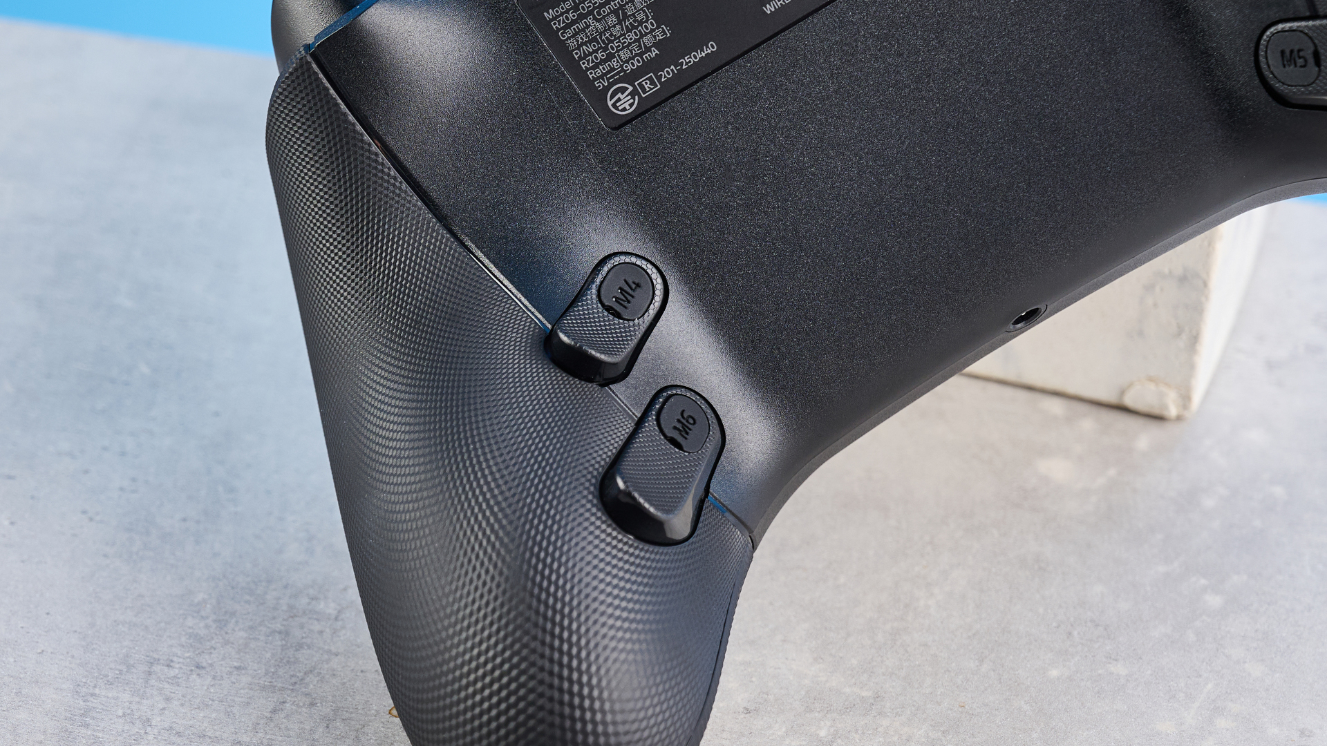 A black Razer Raiju V3 Pro controller for PS5