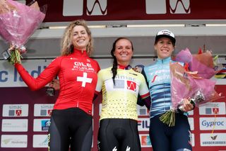 Chantal van den Broek-Blaak takes centre stage on the final podium at the Simac Ladies Tour