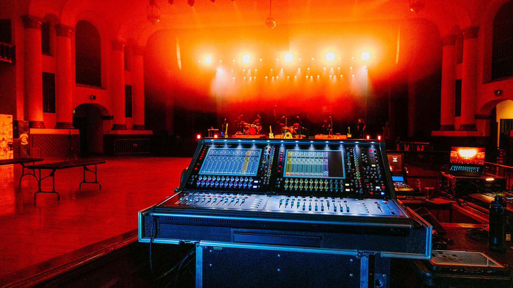 RMA’s new DiGiCo SD12 FOH mixing console with the L-Acoustics L2/L2D arrays silhouetted in the background.